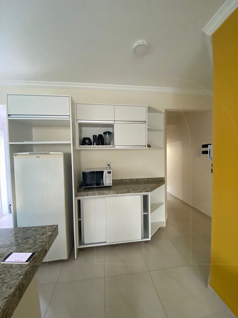 Apartamento 2 dormitorios com ar condicionado, 50 metros da
